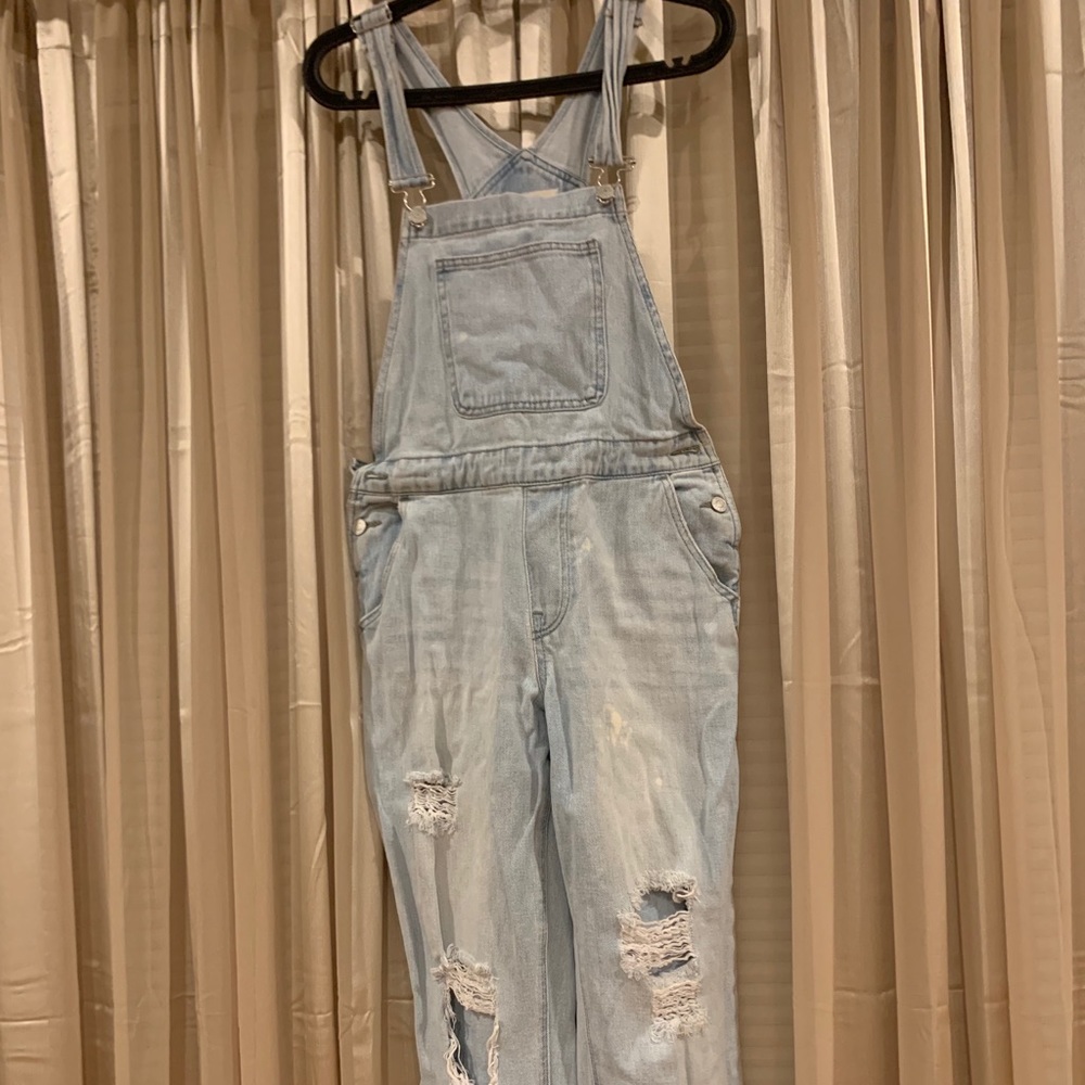 Denim jumpsuit. It’s small to me .